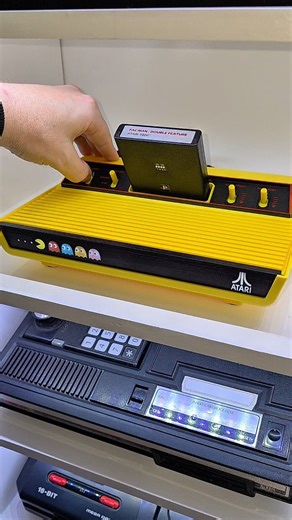 David Wellman on Instagram: "The Pacman edition Atari 2600+ unboxing and gameplay • Plays 2600 & 7800 cartiridges • HDMI output for modern TVs • Original Pac-Man, 2600 & 7800 versions • Same 80s pixels. Same 80s magic Thank you to @atari and @plaion_anz for sending me this beautiful console. P.S. Wearing my super warm Pacman oodie (oversized jumper) on a warm Summer's day to unbox this! 🥵😆 #pacman #atari2600 #gifted"