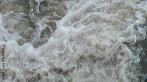 Erupted flood in the wild. Power of water in the spring. dam break, natural disaster on the river