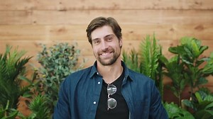 Man, face portrait or shy facial expression in coffee shop, cafe or restaurant for small business ideas, startup pitch or job interview. Happy smile, remote work or creative designer looking nervous