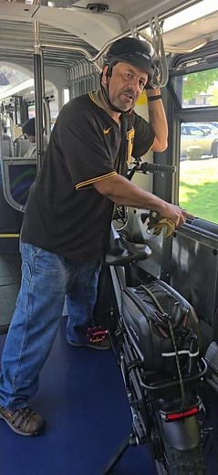 Magician Alpha ebike on city bus