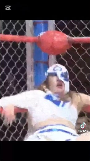 Female wrestler mask ripped and removed