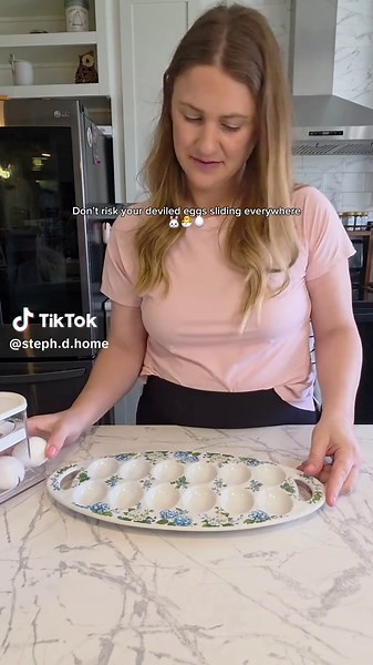 This Temptations deviled egg tray keeps every egg perfectly in place and makes carrying them so much easier with the handles. Plus the blue hydrangea pattern is so pretty for spring hosting. On @QVC, Inc and once these seasonal designs are gone, they’re gone. #easterhosting #deviledeggs #qvc #tiktokshopspringglowup