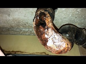 Removing 48 year old Cast Iron Tub Drain.