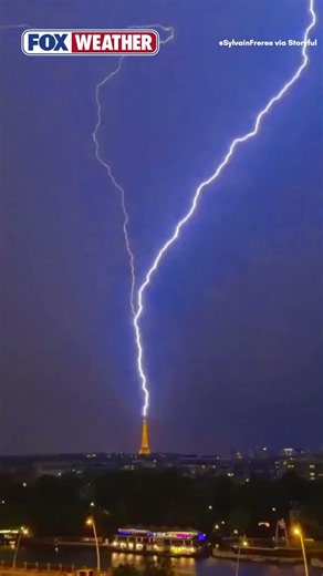 Powerful Lightning Strikes The Eiffel Tower In Paris, France