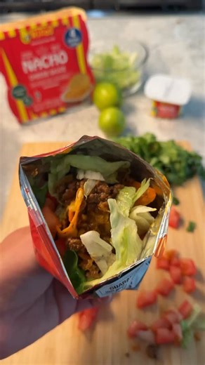 Walking Tacos are one of my favorite quick weeknight meals and an easy lunchbox idea! 🌮 I keep it simple— taco meat, their favorite chips, and a Ricos Nacho Cheese Sauce Cup on the side. They’re made with real cheddar cheese and just the right amount of kick. Super creamy, super convenient, and the kids love ’em! You can grab a 4 pack at your local @walmart —perfect to keep on hand for easy meals and snacks. @ricosproducts #ad #walkingtacos #easymeals #lunchboxideas #walmartfinds #easyrecipe | 