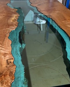 2.2M views · 10K reactions | This incredible design looks as though a river is running through the table  | UNILAD Tech | Facebook