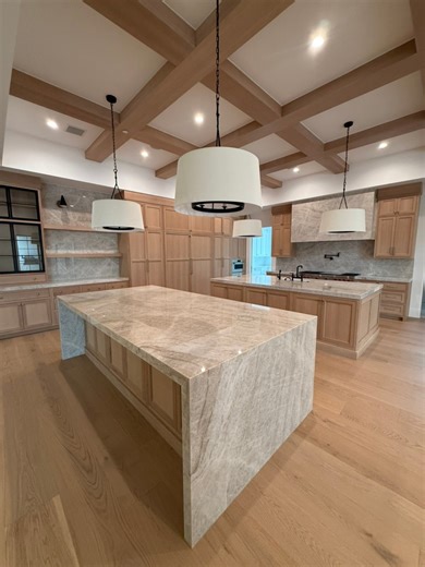 This project truly lives up to its name — #WorthTheWait. An older home once stood here, but we had the opportunity to take it down to the ground and rebuild a completely new custom home from scratch. From the warm wood tones to the waterfall stone island and coffered ceilings, every detail was designed with purpose. Demolition gave way to possibility, and the result is a space that blends modern luxury with timeless craftsmanship. This is what building legacy looks like — starting fresh and crea