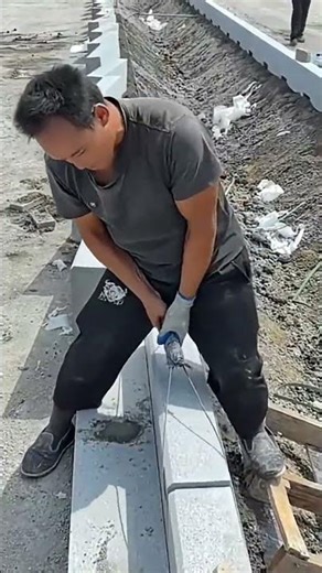 Workers Installing Curb Stones – Smart Tools Increase Productivity