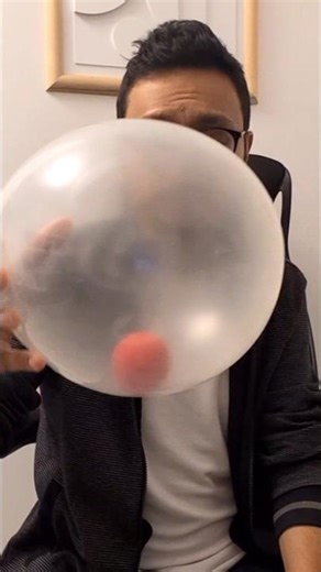 Ball Through Balloon Magic Trick