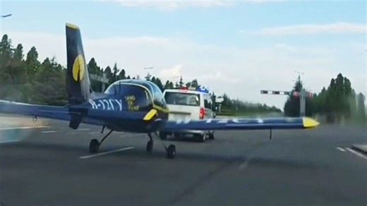 Plane drives in the middle of road in China