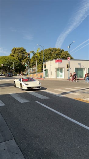 A Tesla Model Y nearly clipped a Ferrari 458 Spider while both were moving through Rodeo Drive, a reminder that even supercars aren’t immune to distracted city traffic. The Ferrari 458 Spider from Ferrari currently trades around $280k–$350k on the market, making moments like this especially tense. Powered by a naturally aspirated V8, the 458 is widely considered one of Ferrari’s last “pure” driver-focused cars before turbos took over. One wrong move here could’ve been a very expensive mistake. #