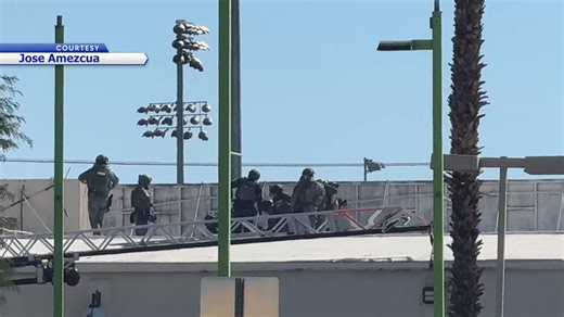 Man in custody after rooftop standoff in Indio