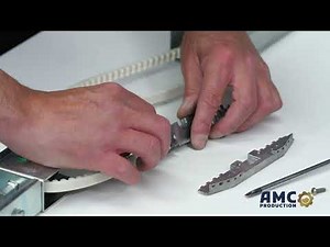 Comment changer le chariot du rail d'une porte de garage sectionnelle ?