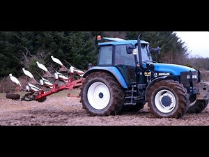 New Holland 8360 ploughing