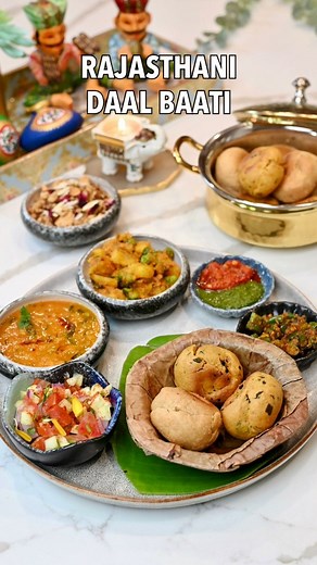 Dal Baati — a quick and simple version of a Rajasthani classic! Spicy tadka dal is paired with soft, melt-in-mouth masala and plain baatis with a drizzle of ghee!✨•Recipe - https://naturallynidhi.com/rajasthani-dal-baati/•#daalbati #vegetarian #vegan #naturallynidhi #dal #dalbaati #tasteofindia #indianrecipes #indiancuisine #vegetarianrecipes #veganrecipes #indianfood #desifood #partyfood #vegetarianfood #fusion #fusionfood #indianfusion #rajasthani #rajasthanifood #plantbased #plantbasedrecipes