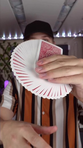 How to Master the Impressive Thumb Fan Card Move
