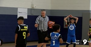 Tucson basketball referee trades in his striped shirt for an Hawaiian shirt