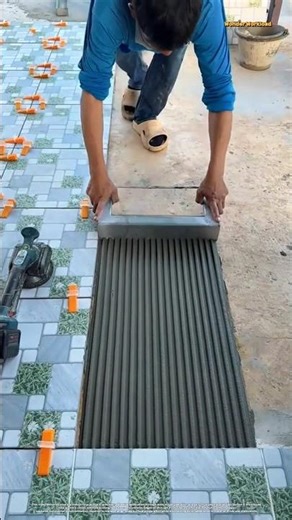 Precision Adhesive Application and Surface Preparation for Floor Tiling Management