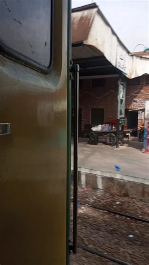 A very fast train passing a Railway station #train #trainshorts #fasttrains