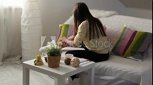 Young woman doing sugar or wax epilation at home. Sugaring depilation. Procedure of applying hair removal paste