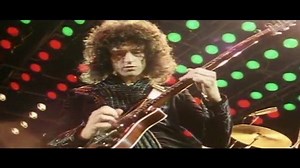 Queen - Don't Stop Me Now (Lyrics In Spanish & English Letras en Inglés y en Español) | RaDio 80