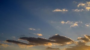 Moving dark clouds on sky background.