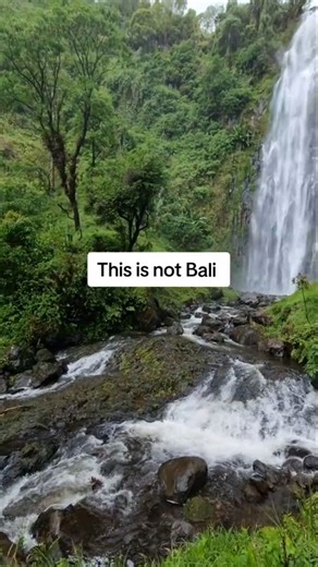 This is Materuni Waterfalls, Tanzania 🇹🇿. Hidden in the lush foothills of Mount Kilimanjaro, Materuni feels like a tropical dream — raw, green, and breathtakingly real. No long flights, no crowds… just pure nature and unforgettable moments. ✨ Want more hidden gems like this? 💬 Join our WhatsApp community for exclusive travel insights, insider tips, and unbeatable travel deals. 📲 Link in bio — don’t miss out! | Fun Travel Moments and Tours