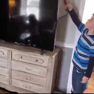 KID SMASHES DAD'S NEW 50INCHES TV USING HAMMER