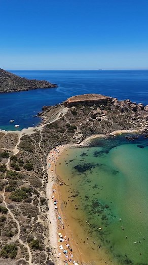 5K views · 132 reactions | Between clay slopes and towering cliffs, with its golden sand and turquoise waters, Għajn Tuffieħa, also known as Riviera Beach, consistently ranks as one of Malta's best beaches among visitors. Ready to see what the hype is all about? #ExploreMore : @skyviewmalta | Visit Malta | Facebook