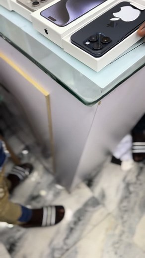 Unboxing the Latest Apple Smartphone in a Retail Setting