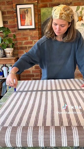 Make a footstool with me 🌼 This beautiful stripe fabric from Penny Morrison is REVERSIBLE. Either side is beautiful and the perfect earthy tones. This whole project was a joy from start to finish! #upholstery #footstool #ottoman #maker #smallbusiness