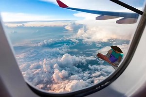 Minecraft Character Floating Through Airplane Window