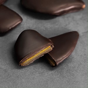 6.8K views · 185 reactions | Chocolate and mango? Trust us...it works We slice real mango and immerse it in mango liqueur (so go steady before 4pm) to help boost the authentic flavour that can be lost in the drying process. Then, we enrobe with 70% dark chocolate to balance the natural mango sweetness. | Hotel Chocolat | Facebook