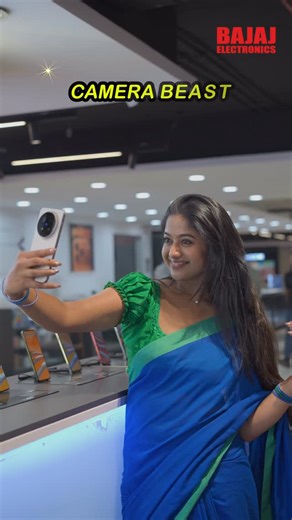 SOUNDARYA R on Instagram: "Visited Bajaj Electronics to check out the new Vivo X300 Series — and wow. The 200MP ZEISS camera is insanely sharp, and the 4K 120FPS video feels like cinema in your hand. I tried the camera, explored the features, and honestly… this one’s made for people who truly love photos and videos. For more details, visit your nearest Bajaj Electronics Store today. #VivoX300 #VivoX300Series #VivoX300Pro #VivoMobiles #BajajElectronics"