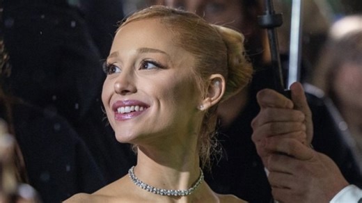 Ariana Grande sings with a fan in the car next door