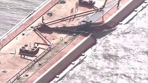 Ship collides with 2 barges, causes gas product spill in Houston Ship Channel