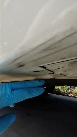 How to level your car on a sloped driveway for transmission oil change?