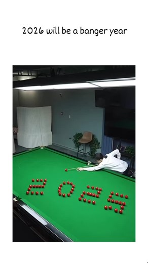 universal mems on Instagram: "The post showcases a snooker trick shot where red balls forming "2026" are broken to reveal "HAPPY NEW YEAR" beneath, posted on 1 January 2026 as an optimistic New Year's greeting. Authored by Tesla investor Aaron Li, a former Amazon engineer focused on Full Self-Driving content, it highlights excitement for 2026, likely tied to anticipated EV and AI progress, amassing over 240,000 likes and 10 million views. Replies mix awe at the precision—evident in the balls' re