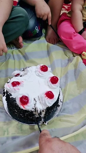 Delightful Cake Interaction with Adorable Child