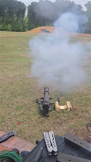 Dan Lancaster firing C battery from black powder cannon