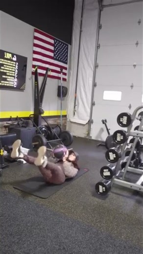 Butts and guts 7.3- lying banded abduction w med ball hold