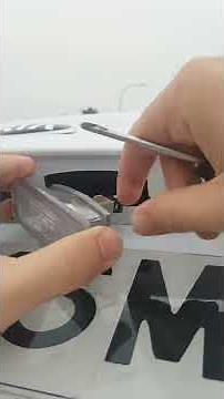 Cambiar bombilla matrícula KIA