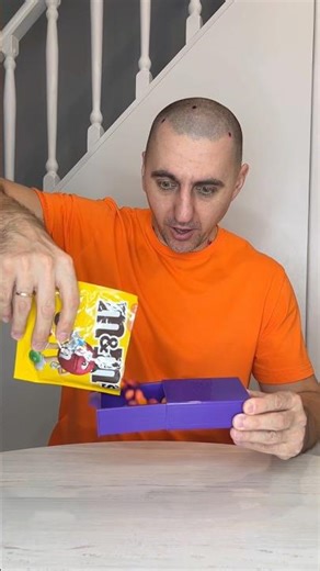 He tried all the ways to get M&M's out of the secret box