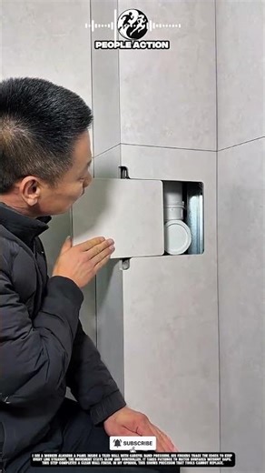 Tile People placing hidden panel during wall finishing 🧱