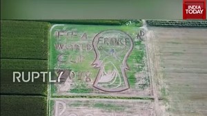 Italian farmer ploughs giant message in field for FIFA champions France