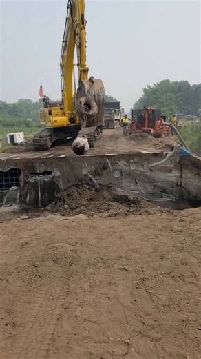 Bridge demolition with the wrecking ball. Slow, deliberate, and powerfully effective. A sight to see.