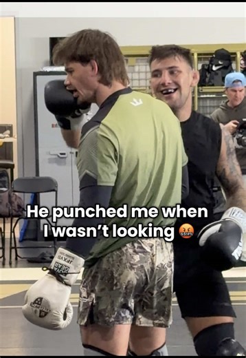 Unexpected Punch During MMA Sparring Session