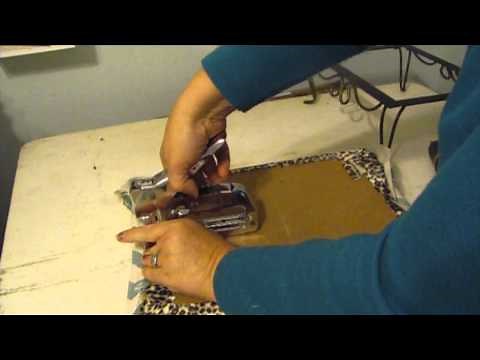 Recovering a footstool with cute Chevron fabric and a broken staple gun