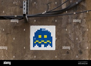A mosaic by ’Invader’ well-known French street artist, whose street mosaics are modelled on the crude pixellation of 1970s–1980s video games. He took Stock Photo - Alamy