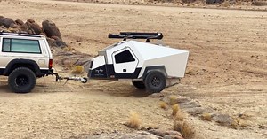Polydrops tugs its electric polyhedral teardrop trailer off road